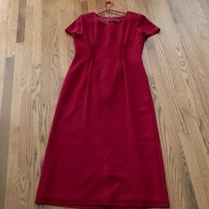 Beautiful red dress perfect for Christmas. Worn twice excellent condition.